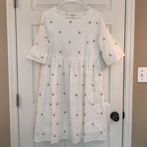 White Dress with Embroidered Floral Detail